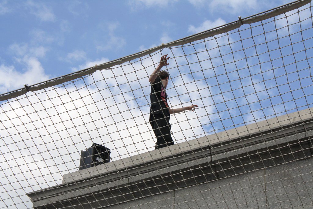 a man walking on a net
