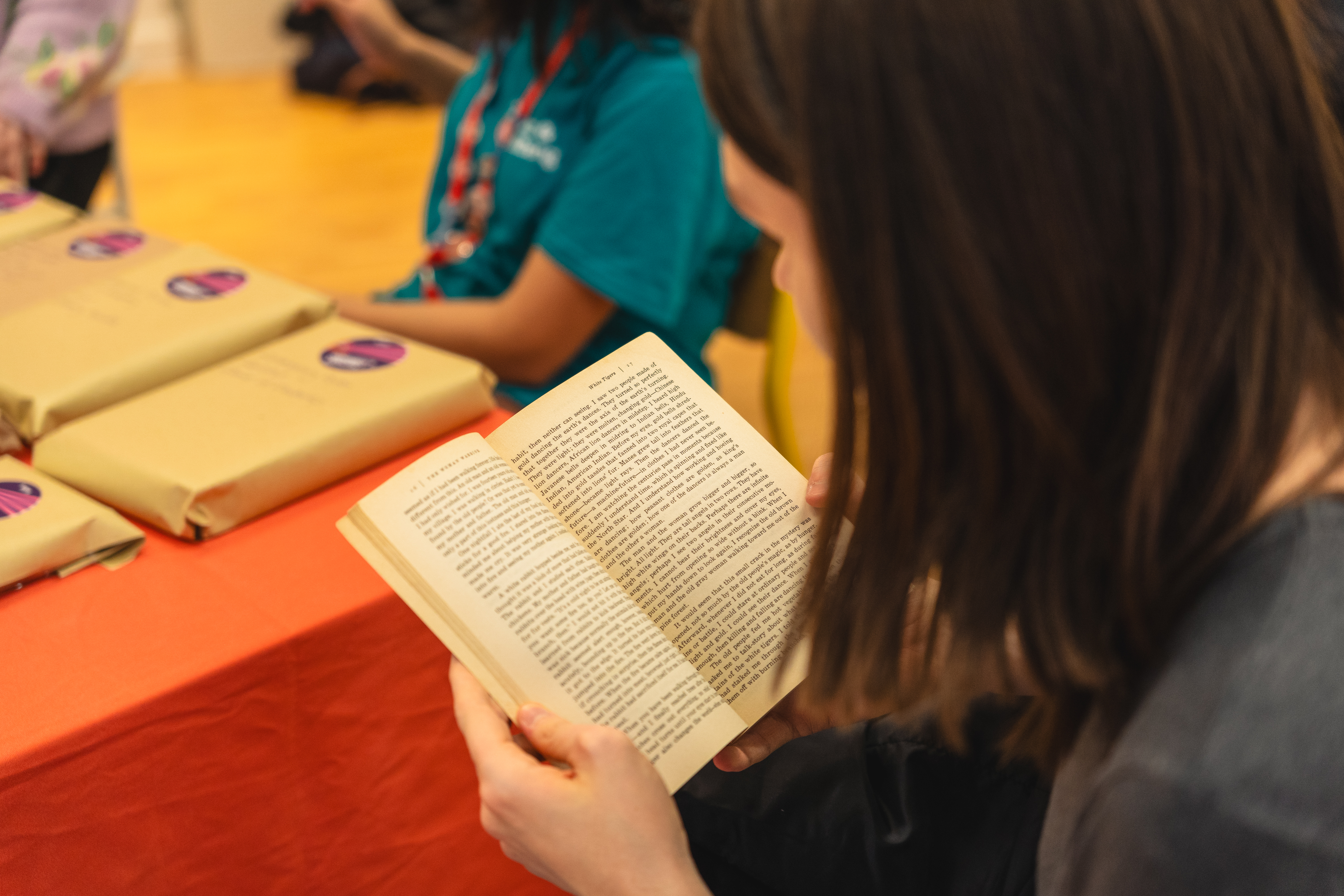 Student reading book at blind date with a book.
