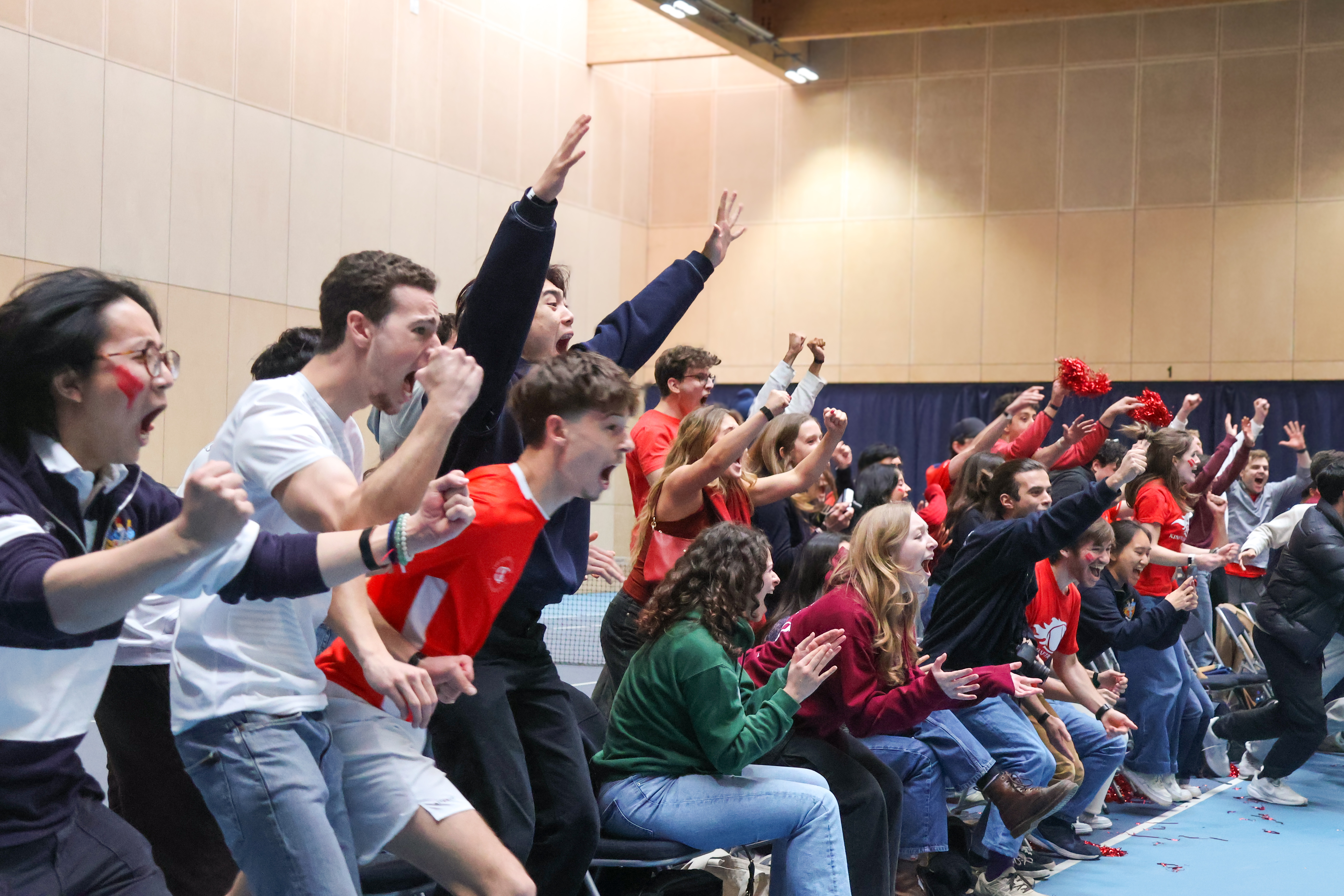 People cheering at Varsity.