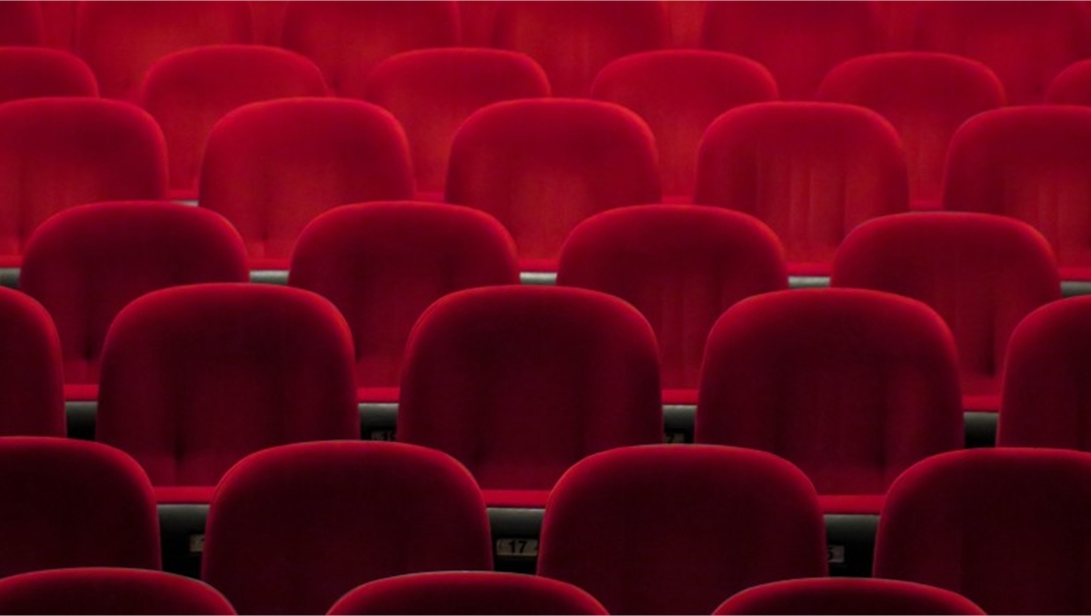 Rows of red cinema seating
