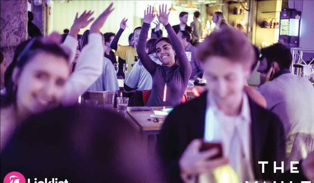 Students dancing in a bar